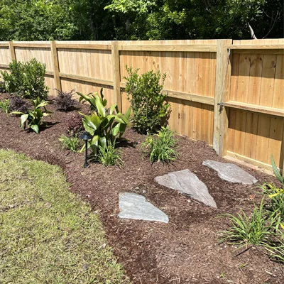 landscape maintenance, flower bed cleanup and mulching