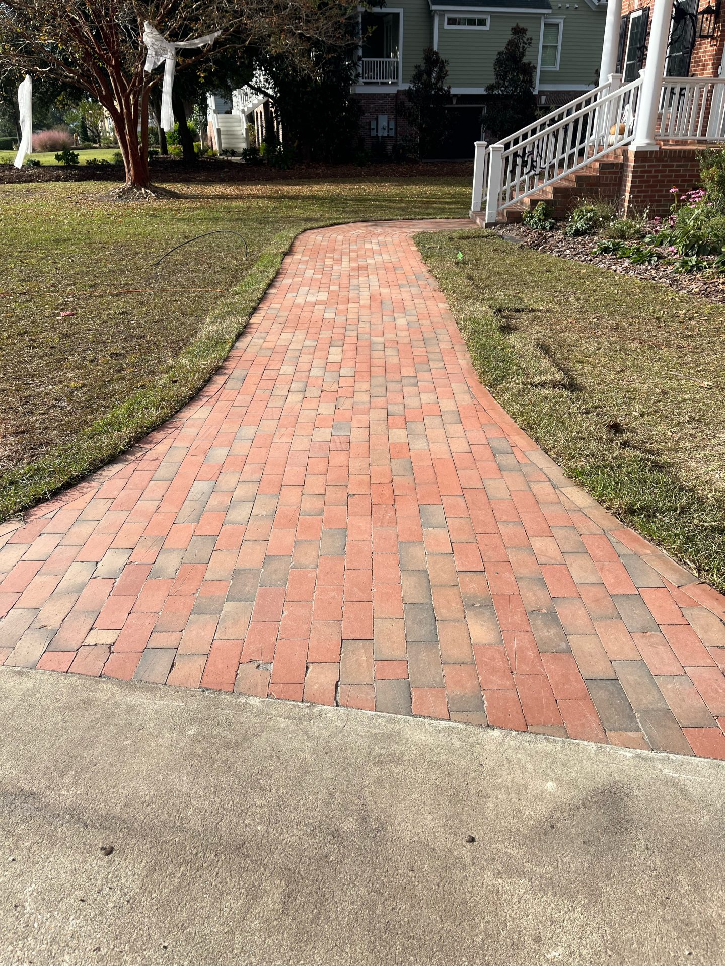 Brick pathway leading to house entrance
