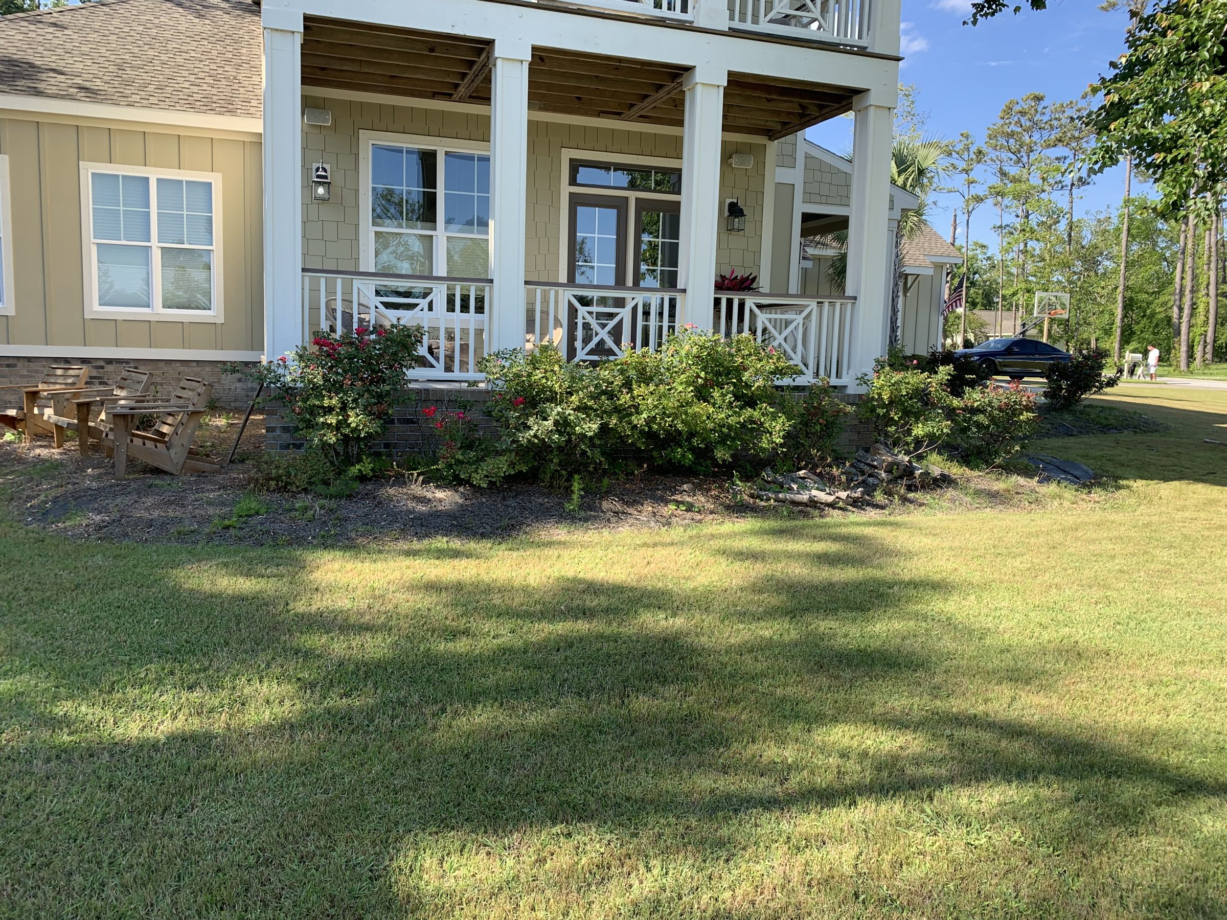 House with porch and garden landscape
